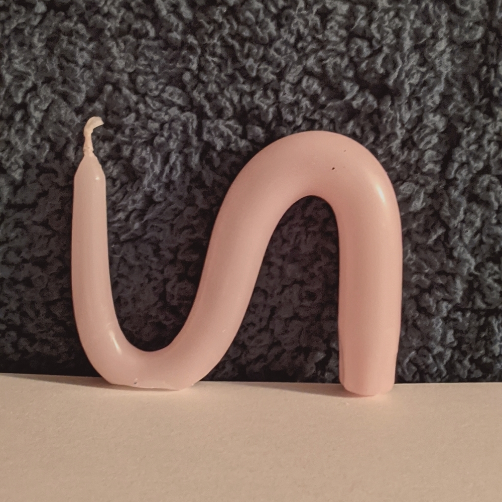 Light pink aesthetic candle bendy